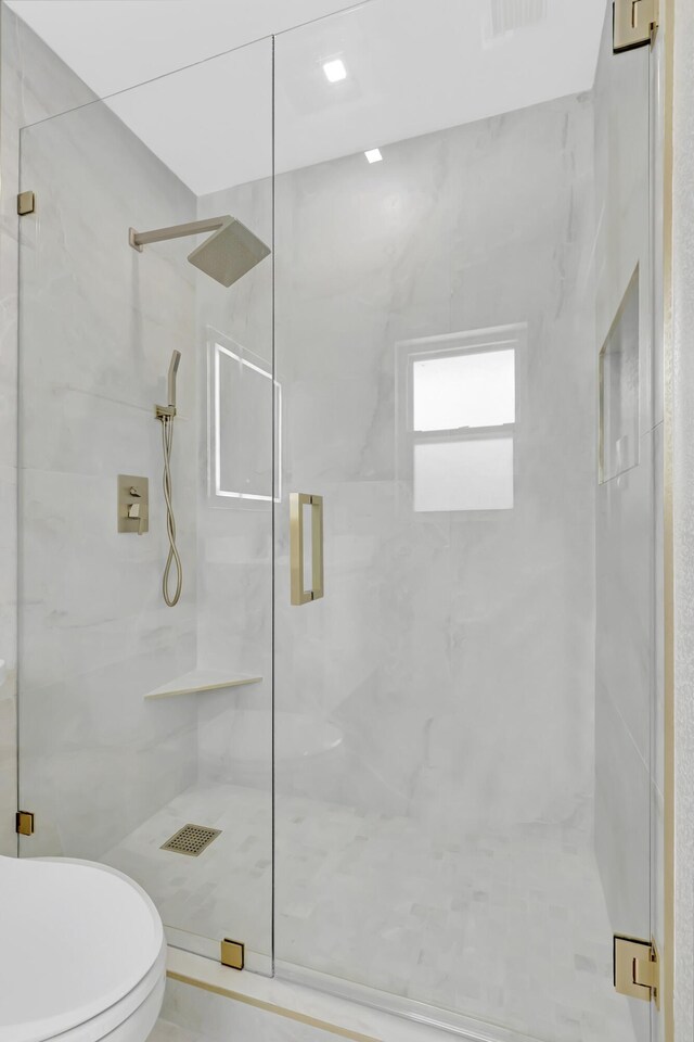 530 NW 14th St, Delray Beach, FL 33444 - bathroom with a marble finish shower and toilet