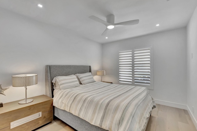 530 NW 14th St, Delray Beach, FL 33444 - bedroom with wood finished floors, baseboards, and a ceiling fan