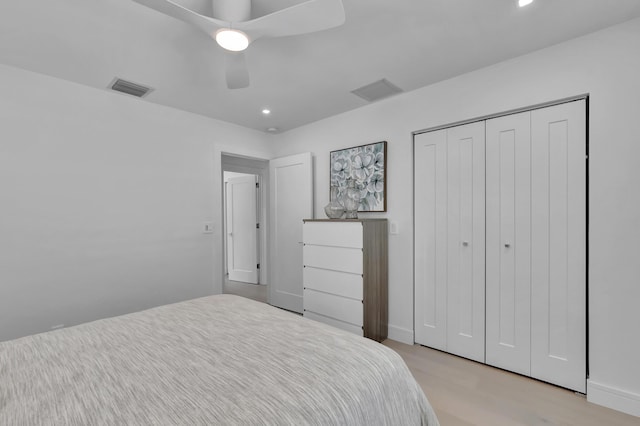 530 NW 14th St, Delray Beach, FL 33444 - bedroom with light wood-type flooring, recessed lighting, a closet, and ceiling fan