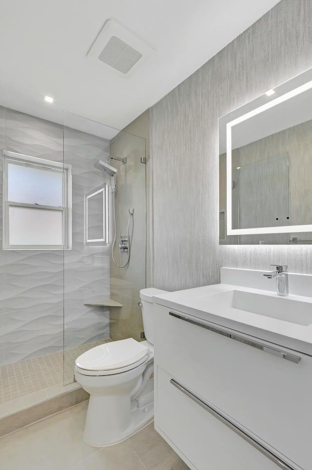 530 NW 14th St, Delray Beach, FL 33444 - full bathroom featuring toilet, walk in shower, vanity, and tile patterned flooring
