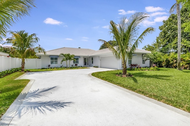 530 NW 14th St, Delray Beach, FL 33444 - single story home featuring a garage, stucco siding, and concrete driveway