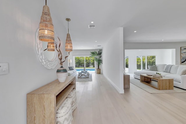530 NW 14th St, Delray Beach, FL 33444 - corridor featuring light wood-style floors, recessed lighting, and baseboards