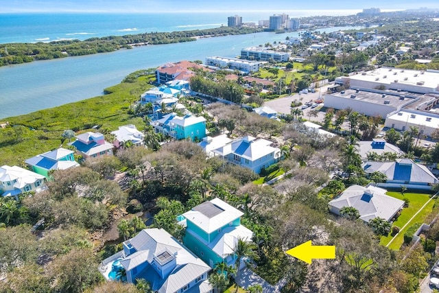 birds eye view of property featuring a water view