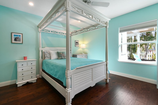 bedroom featuring ceiling fan and dark hardwood / wood-style flooring