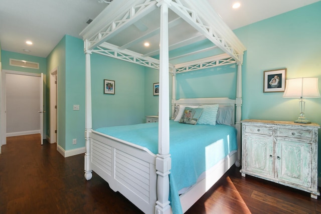 bedroom featuring dark wood-type flooring