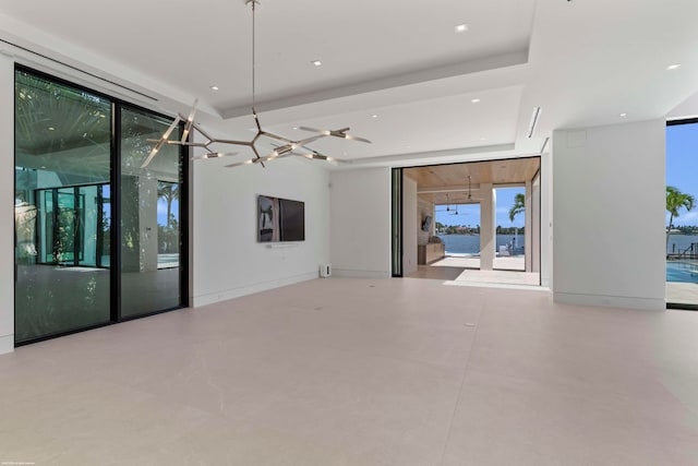 empty room with a raised ceiling