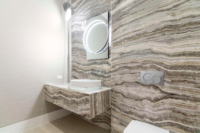 bathroom featuring vanity, toilet, and tile patterned flooring