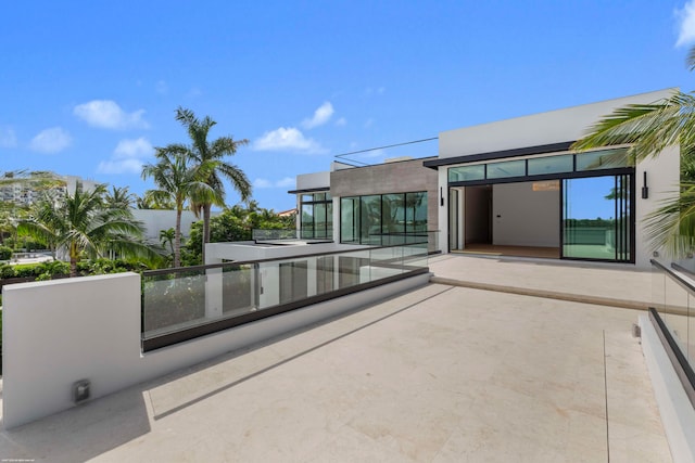 view of patio / terrace with a balcony