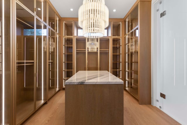 interior space with light hardwood / wood-style flooring and a chandelier