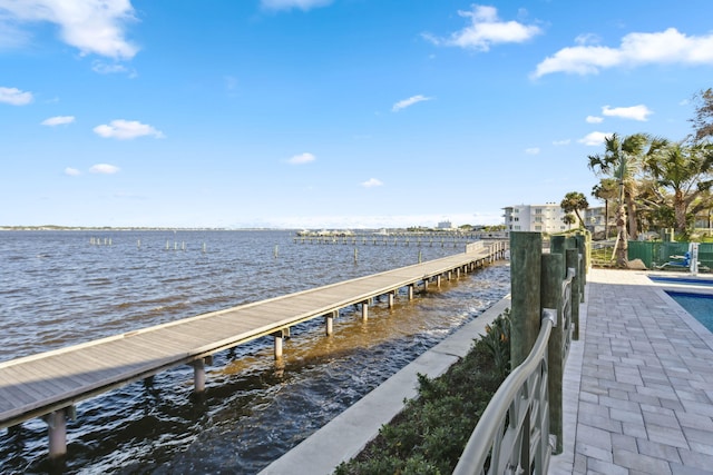 dock area with a water view