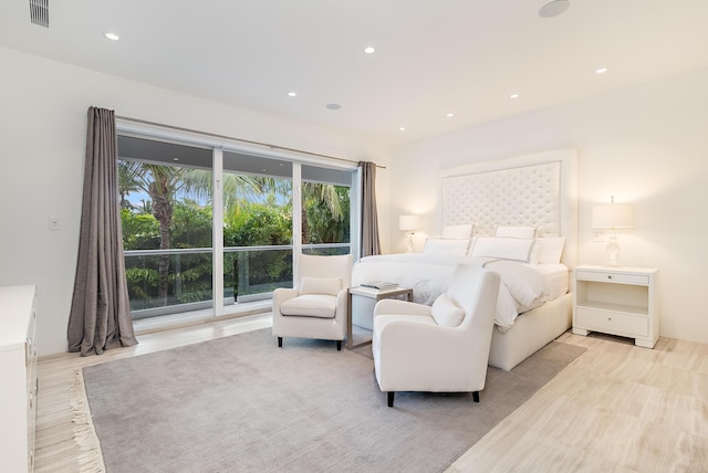 bedroom with recessed lighting and visible vents