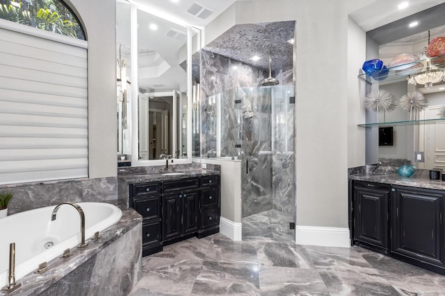 bathroom with tile flooring, vanity, and separate shower and tub