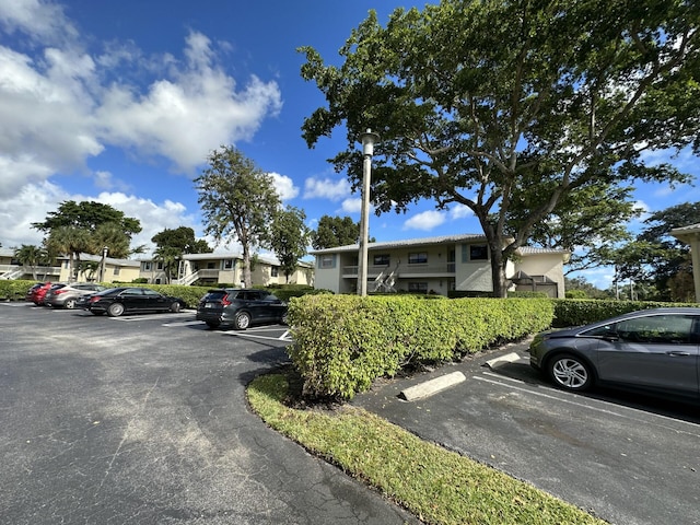 view of front of property featuring uncovered parking