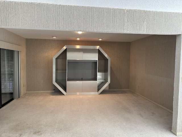 additional living space with carpet flooring