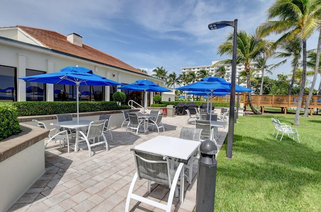 view of patio featuring a playground