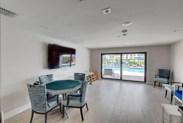 dining room featuring light wood-type flooring