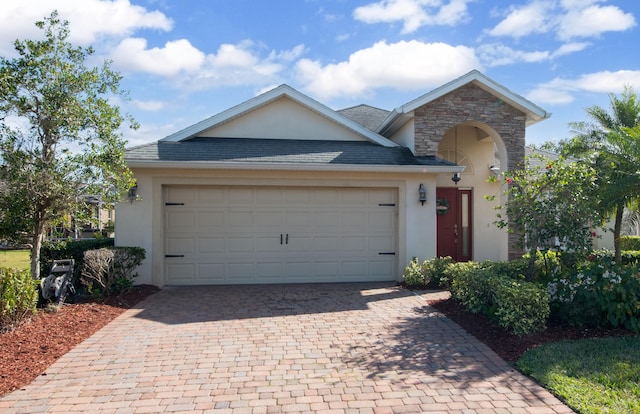 ranch-style house featuring a garage