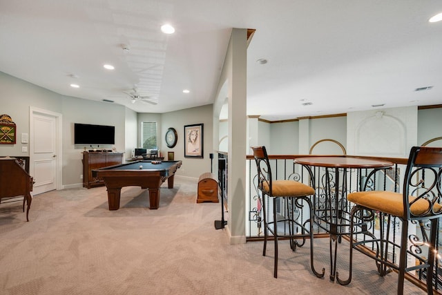 recreation room with ceiling fan, light colored carpet, and pool table