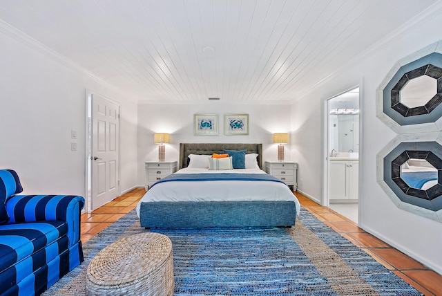 tiled bedroom featuring crown molding, wood ceiling, and ensuite bath