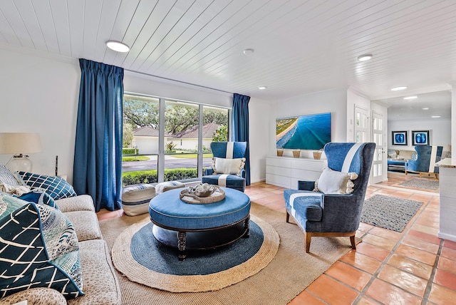 tiled living room featuring ornamental molding and wooden ceiling