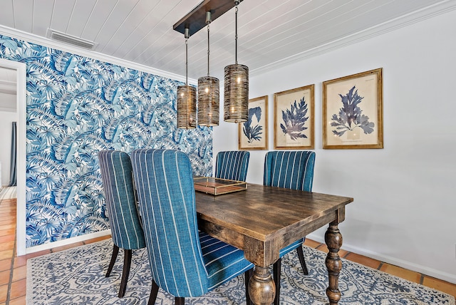 dining room with tile patterned flooring, ornamental molding, and wood ceiling