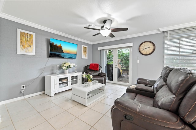 tiled living room featuring french doors, crown molding, and ceiling fan