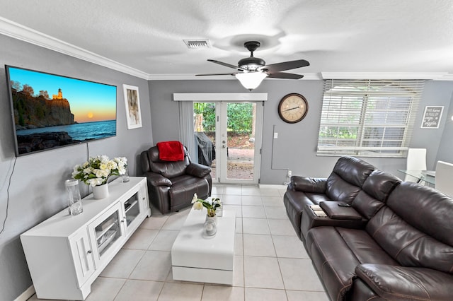 tiled living room with crown molding, a textured ceiling, and ceiling fan