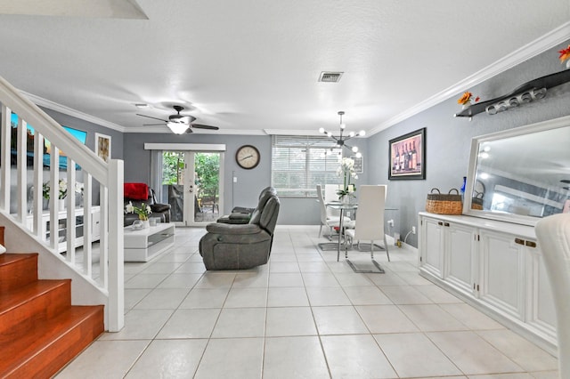 living room featuring light tile patterned flooring, ceiling fan with notable chandelier, french doors, a textured ceiling, and crown molding