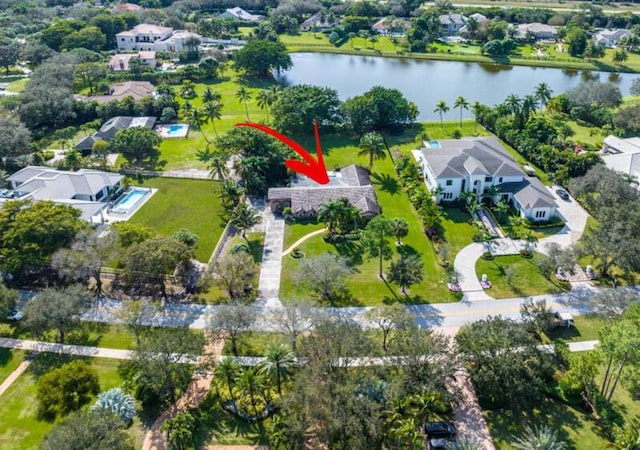 birds eye view of property featuring a water view