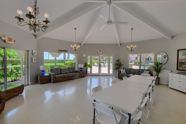 dining space with high vaulted ceiling, a healthy amount of sunlight, and beam ceiling