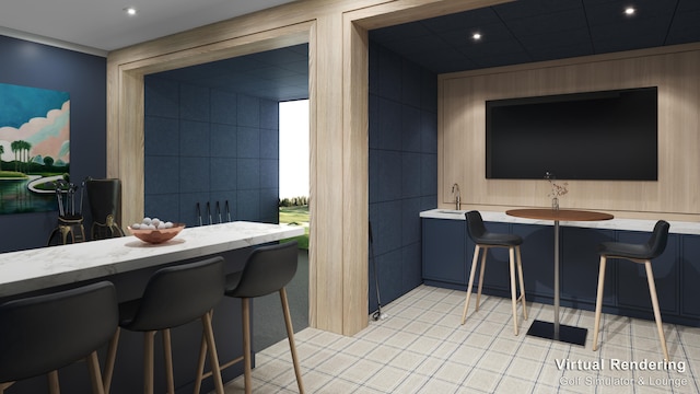 interior space with tile walls, a kitchen bar, and light tile patterned floors