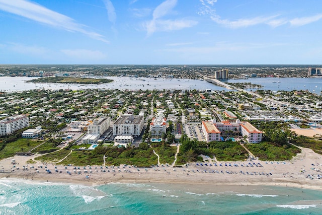 bird's eye view with a water view and a view of the beach