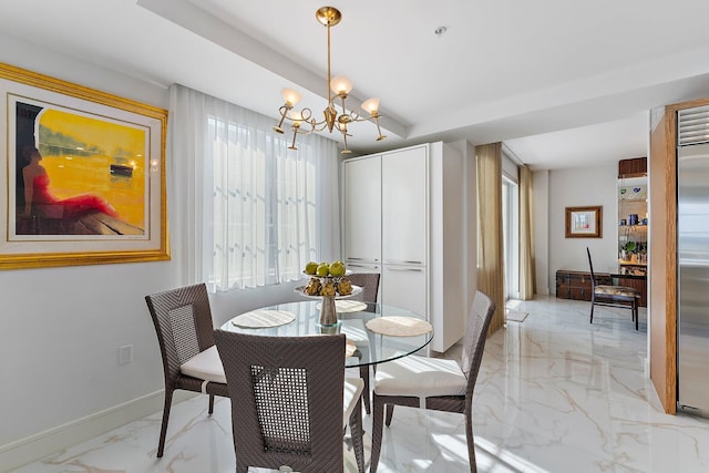 dining area with a chandelier