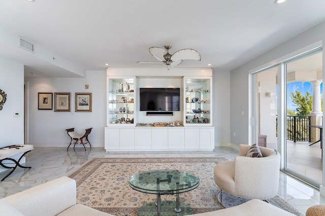 living room featuring ceiling fan