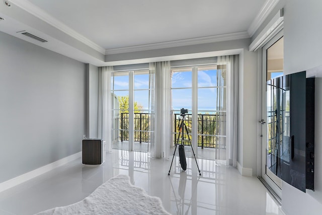 doorway to outside with light tile patterned flooring, ornamental molding, and french doors