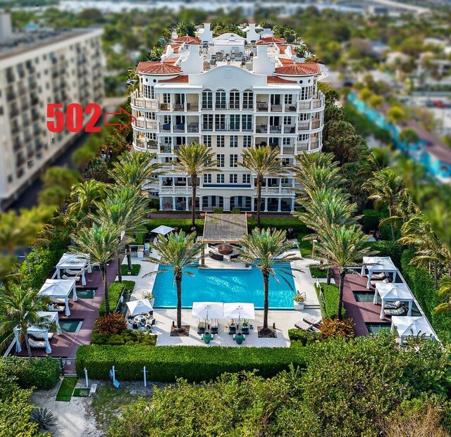 view of swimming pool with a gazebo and a patio area