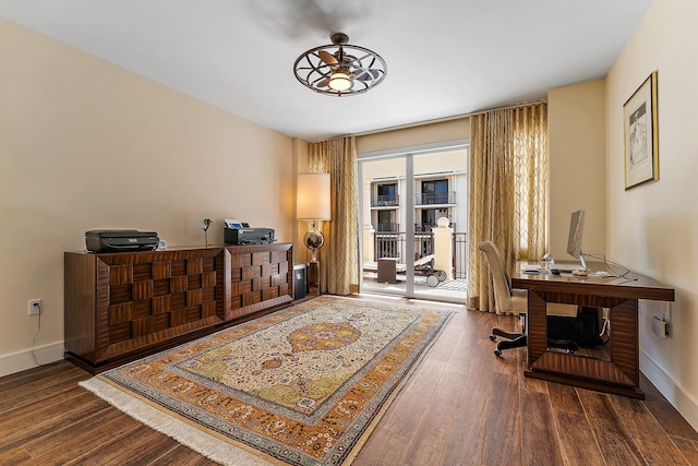 sitting room with ceiling fan and hardwood / wood-style floors