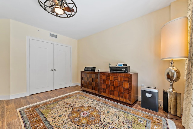 entrance foyer with hardwood / wood-style floors and ceiling fan