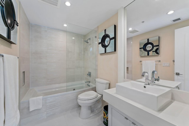 full bathroom featuring vanity, toilet, and combined bath / shower with glass door