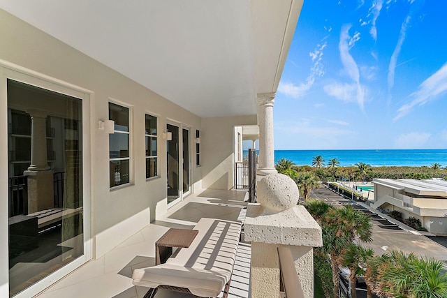 view of patio / terrace with a water view