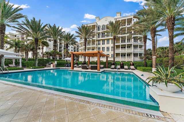 view of swimming pool with a patio area