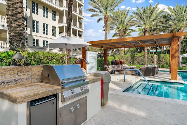 view of patio with a pergola, an outdoor hangout area, a community pool, exterior kitchen, and grilling area