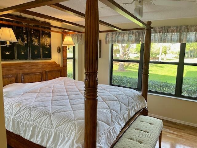 bedroom with light hardwood / wood-style floors