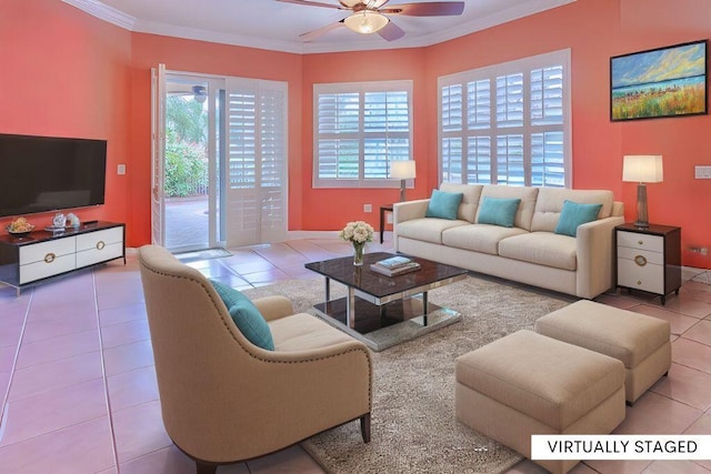 living room featuring ornamental molding, ceiling fan, and light tile patterned flooring