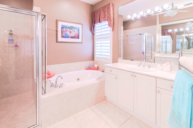 bathroom with tile patterned floors, vanity, and plus walk in shower