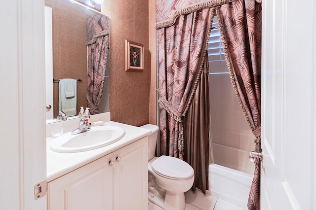 full bathroom with shower / bath combo, vanity, tile patterned floors, and toilet