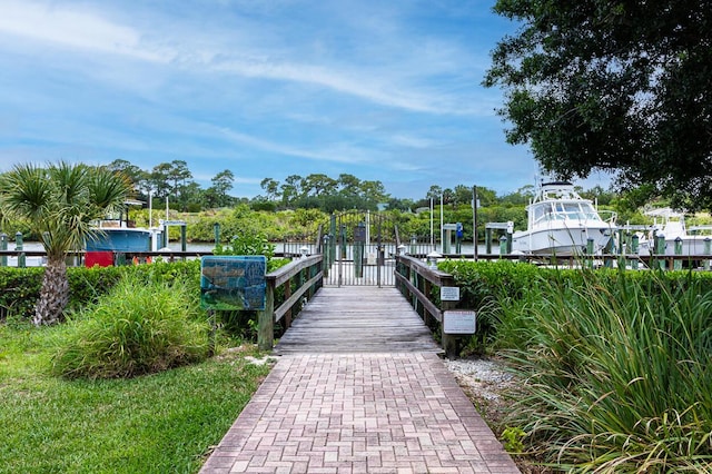 dock area featuring a water view