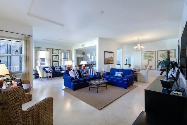 living room with an inviting chandelier