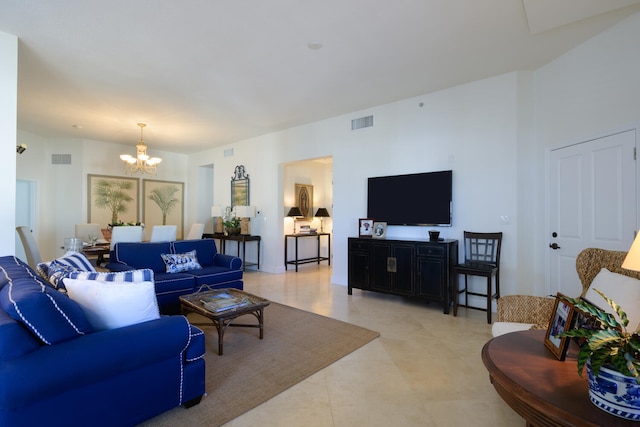 living room with an inviting chandelier