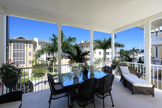 view of patio featuring a balcony